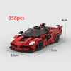 A red classic supercar building block model with clear windows and details.