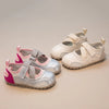 A set of pink and silver casual slip-on shoes for girls with breathable PU upper shown on a light background.