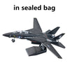 A black A-10 Warthog military model airplane in a sealed bag.