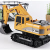 A yellow 1:24 scale remote control excavator with black tracks and a shovel is shown on a white background.