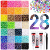 A collection of colorful resin jelly rhinestones and craft gems in various shades and sizes.