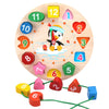 A wooden clock face with numbers and shapes, featuring a penguin design for early learning.