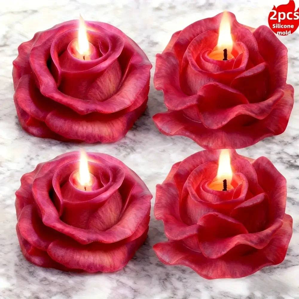 Red silicone rose mold with a lit candle inside, used for cake and chocolate decorating.