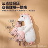 A white unicorn plush toy designed as a soothing pillow for babies.