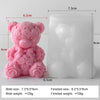 A pink rose bear silicone mold and its finished product, showing the size difference.