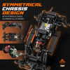 A black 1:18 scale RC rock crawler chassis design featuring a symmetrical build with a hydraulic shock and aluminum alloy gir
