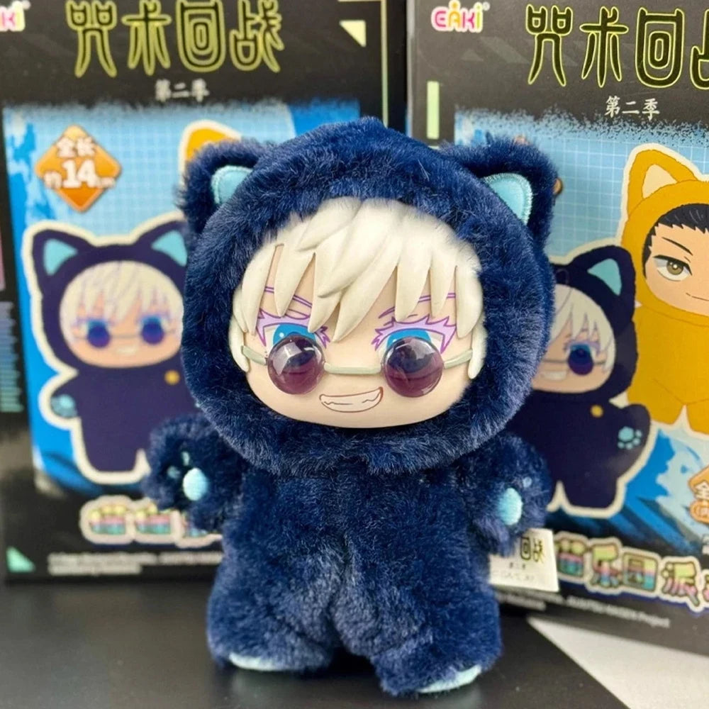 A dark blue cat ear plushie with white hair and glasses is displayed in front of its packaging.