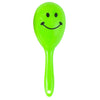 A bright lime green plastic mini maracas shaker toy with a smiling face.