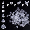 Various clear silicone earring backs and closures shown individually and in a pile.