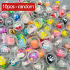 A collection of 10 random transparent plastic eggshell party favors with various colorful decorations.