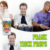 A bottle of Super Stink Mega Bottle prank trick props shown next to three men.