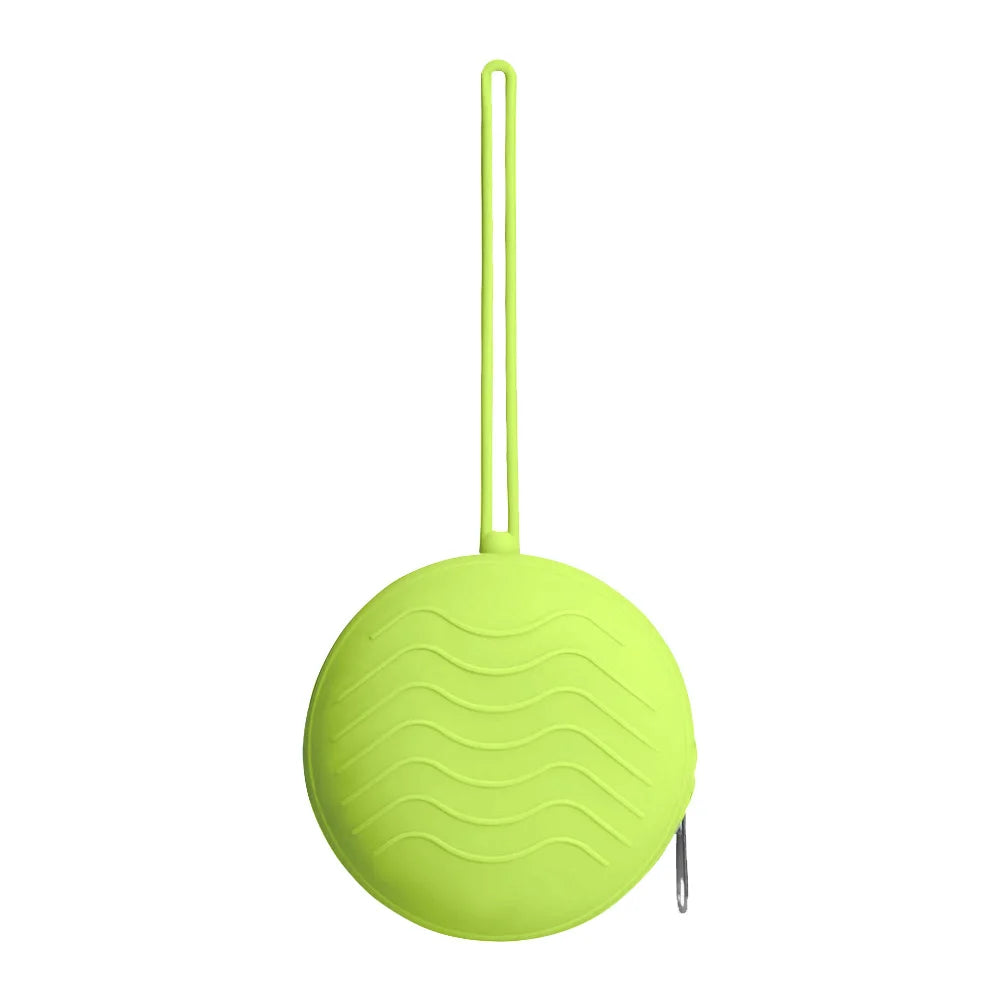 A bright lime green silicone pacifier holder with a long loop and a round base.
