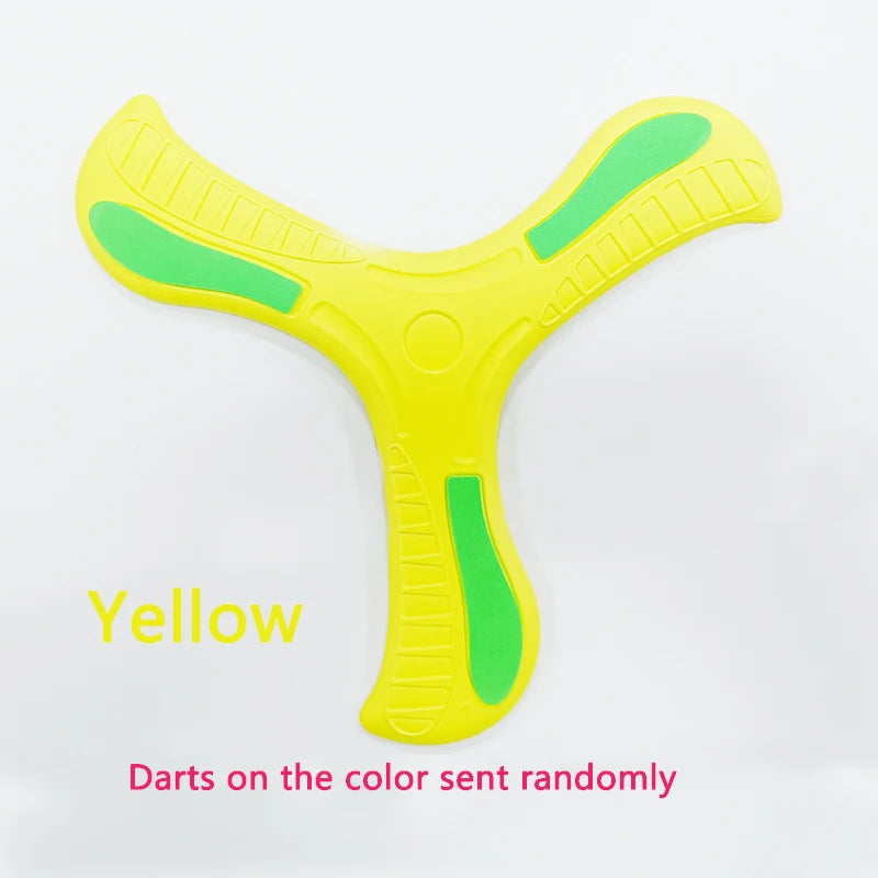 A yellow soft foam boomerang flying disc with green accents.