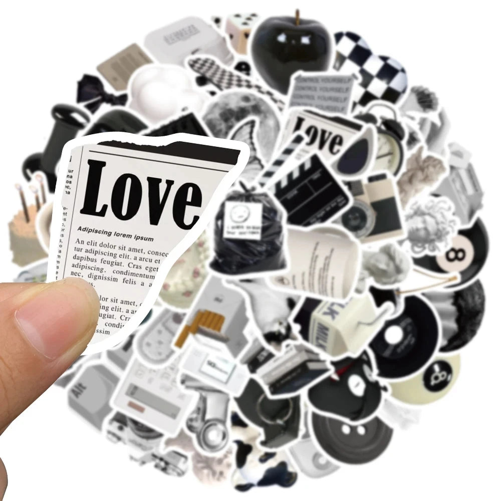 A collection of minimalist black and white stickers featuring various icons and text elements.