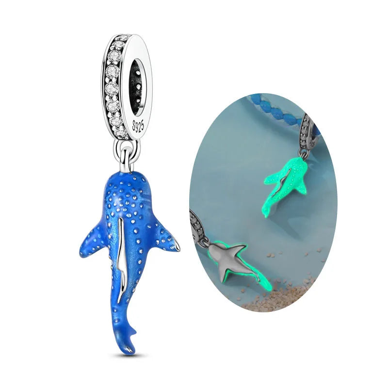 Sterling silver ocean life charm pendant set featuring starfish, sea turtle, and whale shark charms.
