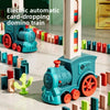 Electric automatic card-dropping domino train toy with colorful blocks on a white surface.