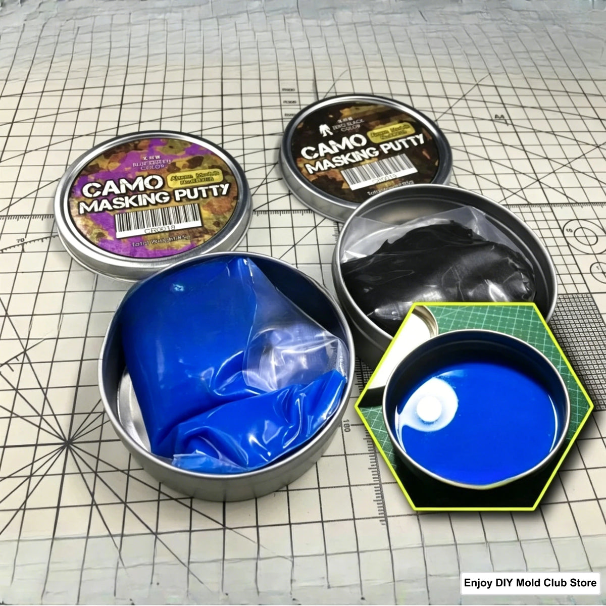 A set of camo masking putty and a blue modeling clay are displayed on a grid surface.
