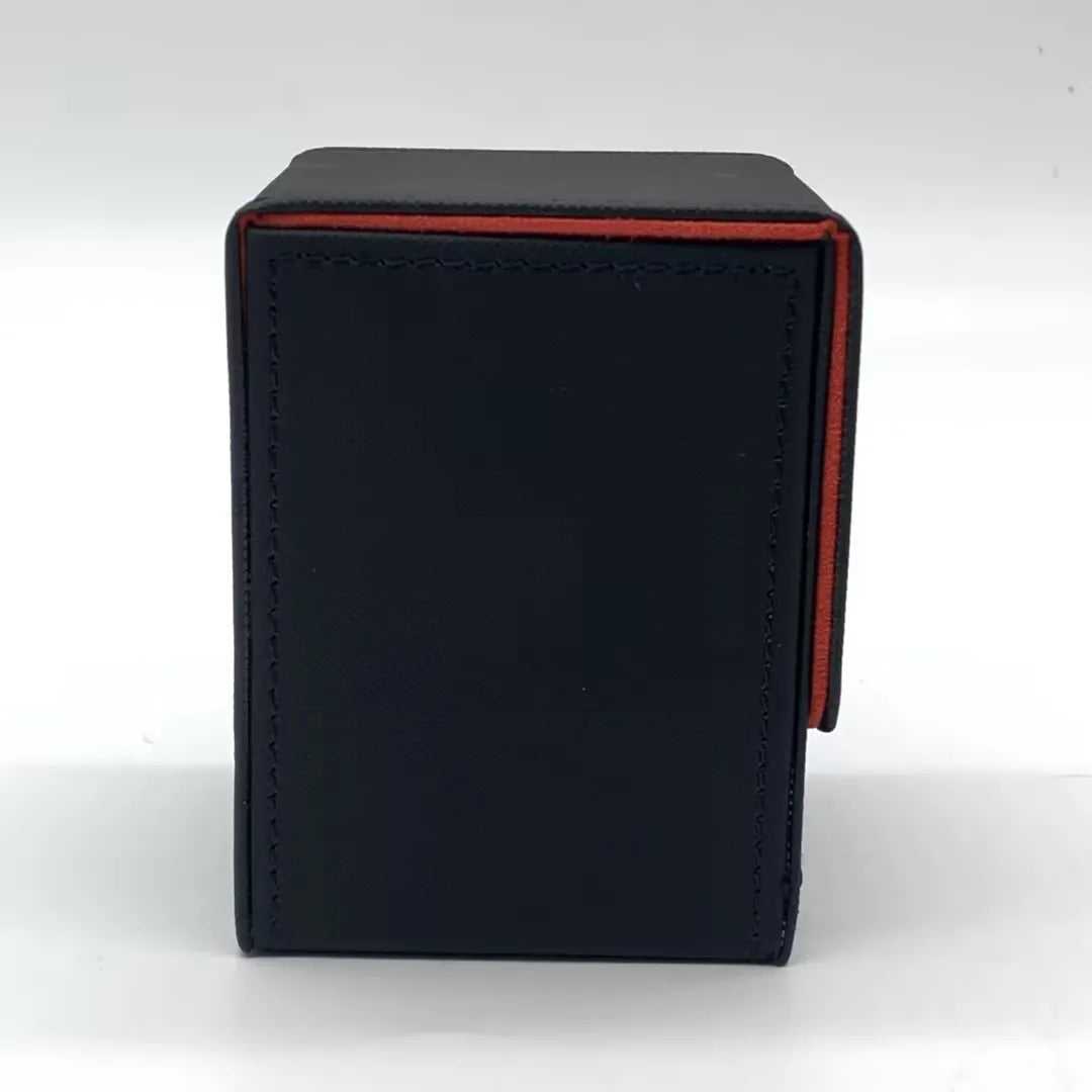 A black leather deck box with an orange accent stitching, shown from the front.