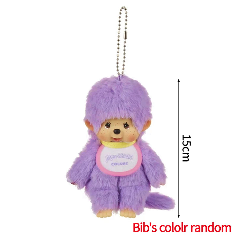 A purple plush cartoon character keychain charm with a silver chain and a round pink tag.