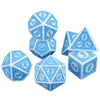 A set of seven blue and white polyhedral dice used for role-playing games