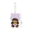 A purple cartoon plush character with large ears and a small brown body is shown hanging from a silver chain.