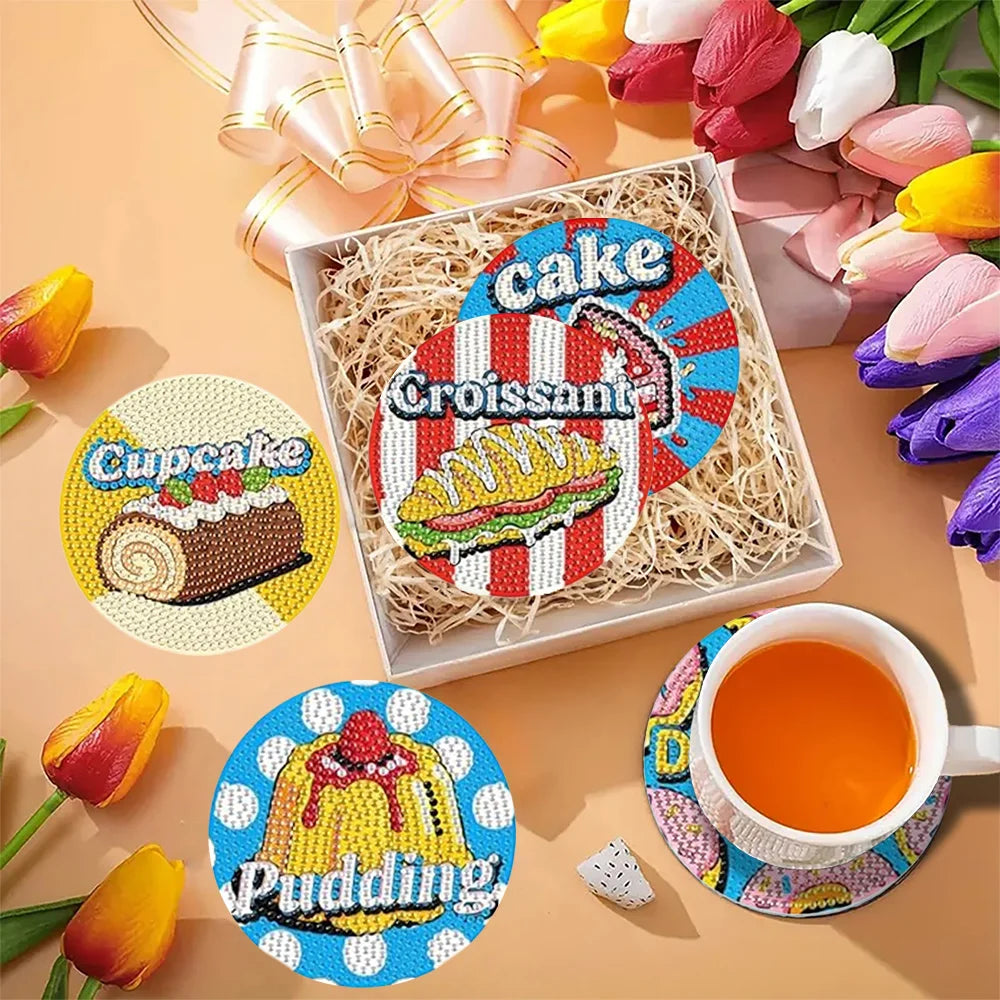 Diamond painting coasters featuring food items like cake croissant and pudding