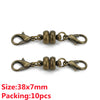 A pair of antique brass magnetic clasps for jewelry making, packaged in a 10-piece set.