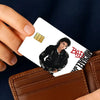 A hand holds a white card with a black and red design featuring Michael Jackson's silhouette and a gold fist symbol.