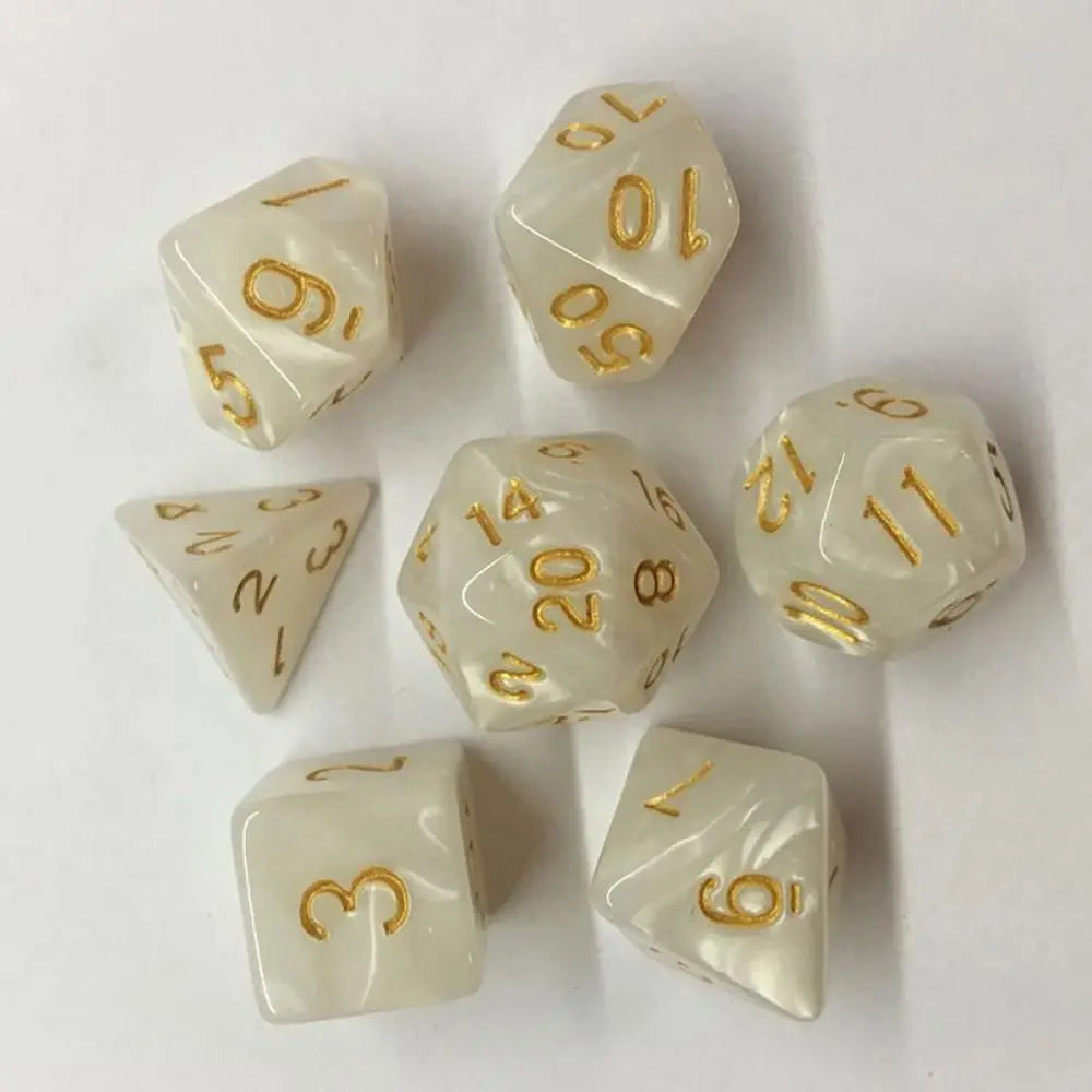 A set of ten white acrylic polyhedral dice, including d6s, d8s, and d10s, displayed on a white surface.
