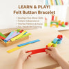 Hands are assembling a red felt button bracelet for fine motor skill development.