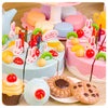 A colorful DIY pretend play birthday cake tea set featuring pink and purple cakes, fruit, and decorative elements.