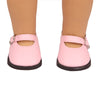 Pink unicorn skirt outfit for an 18-inch doll shown on a person's leg.