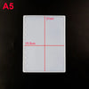 A white silicone mold for an epoxy resin notebook cover, showing dimensions of 21cm by 15.5cm.