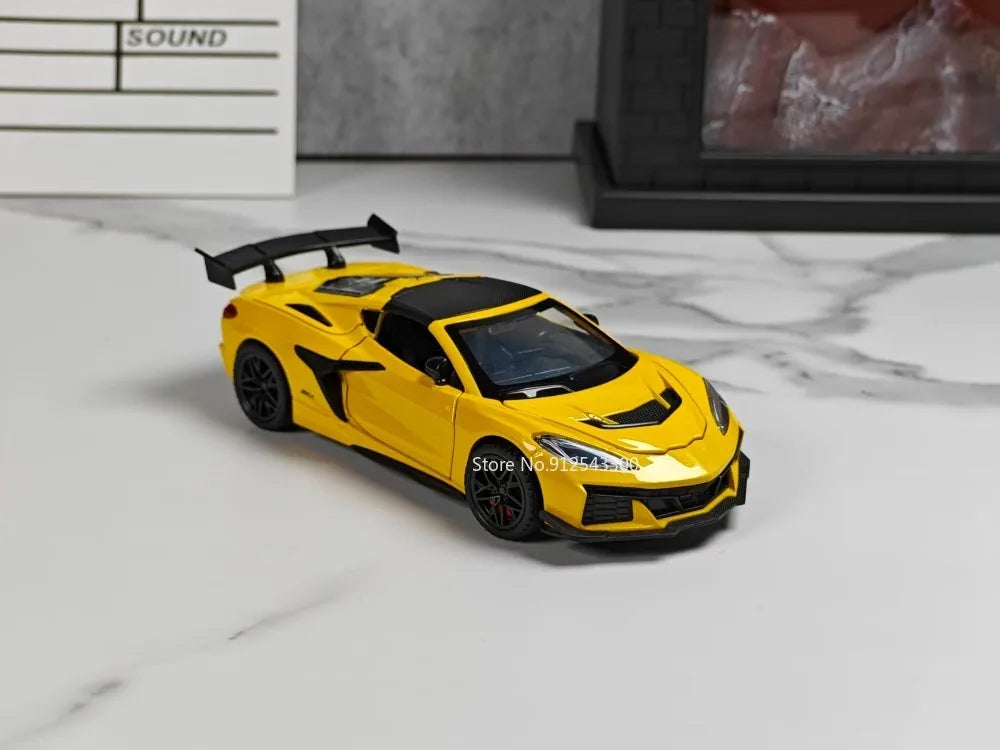 A yellow 1:32 scale diecast supercar model with pull-back action displayed on a white marble surface.