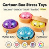 A collection of colorful glitter dumpling stress toys including pink, yellow, and blue squishy balls in wooden containers.