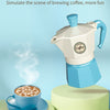 A blue and white mock coffee pot is shown with a cup of coffee on a green surface, simulating a fun picnic scene.