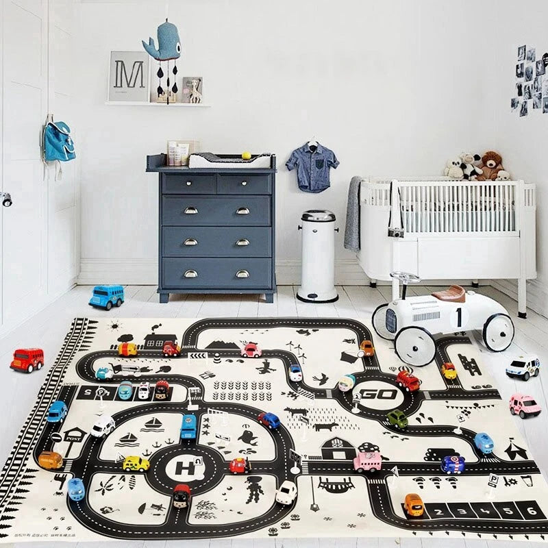 A play mat featuring a detailed city road map layout for children to use in imaginative play.