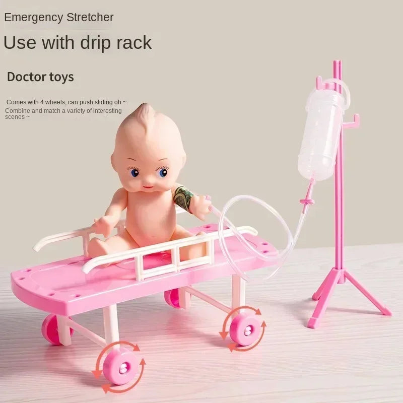 Pink emergency stretcher toy with wheels and a doctor set for role play