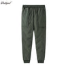 Dark olive green waterproof winter pants for kids with a fleece lining