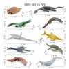 A mini set of 10 realistic ocean animal figurines including a whale, shark, dolphin, turtle, and penguin.