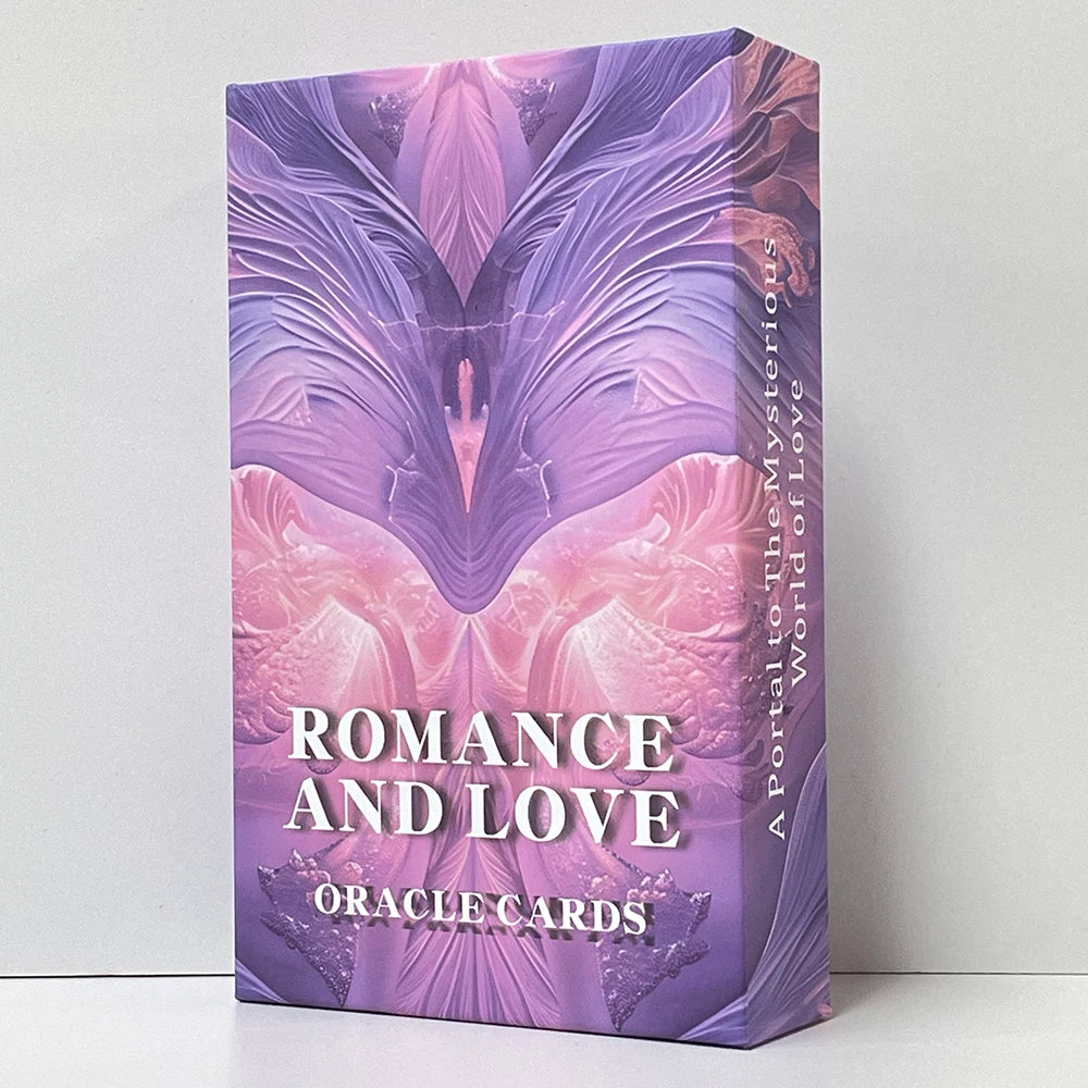 A box of Romance and Love Oracle Cards featuring purple and pink floral designs.