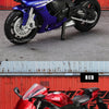 A blue Yamaha sport bike die-cast model shown in a studio setting.
