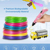 A hand holds a pink filament spool and a yellow fan-shaped component, next to coiled multi-colored PLA filament and a toy tra