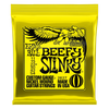 A yellow foil package of Ernie Ball Beefy Slinky nickel wound electric guitar strings.