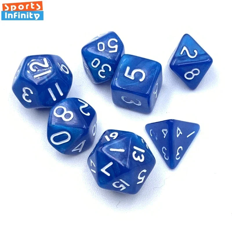 A set of seven blue polyhedral dice, including d6s and d8s, scattered on a white surface.