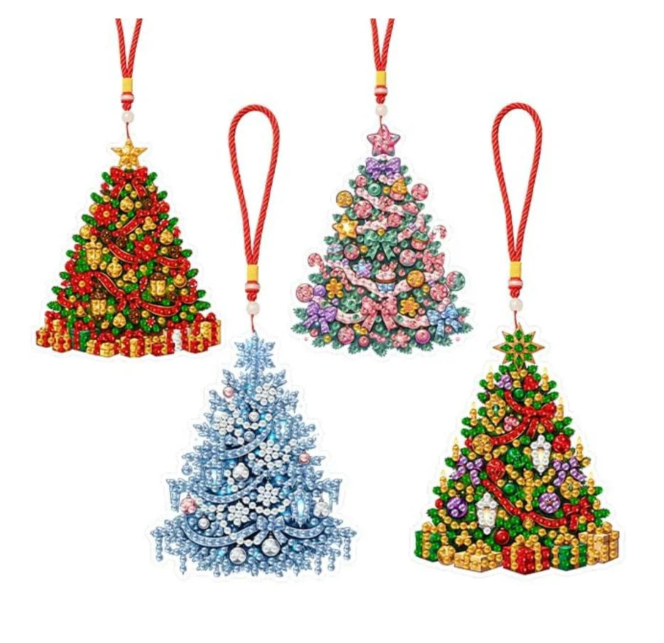 A set of Christmas diamond painting ornaments featuring colorful, sparkling trees suspended by red ribbons.