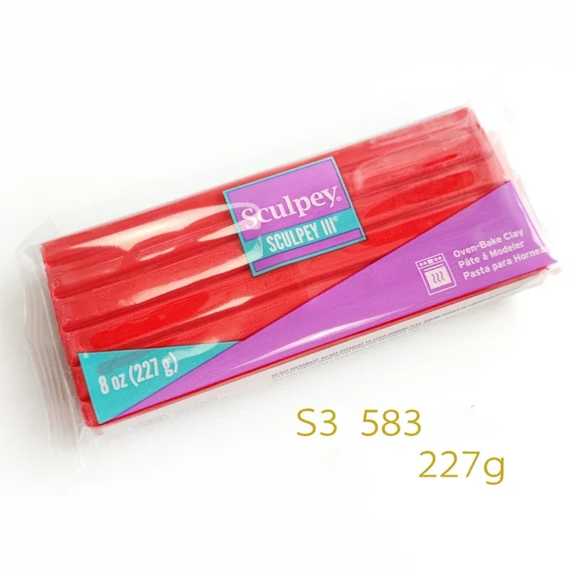 A block of red Sculpey III polymer clay labeled 8 oz (227 g) for oven-bake jewelry making.