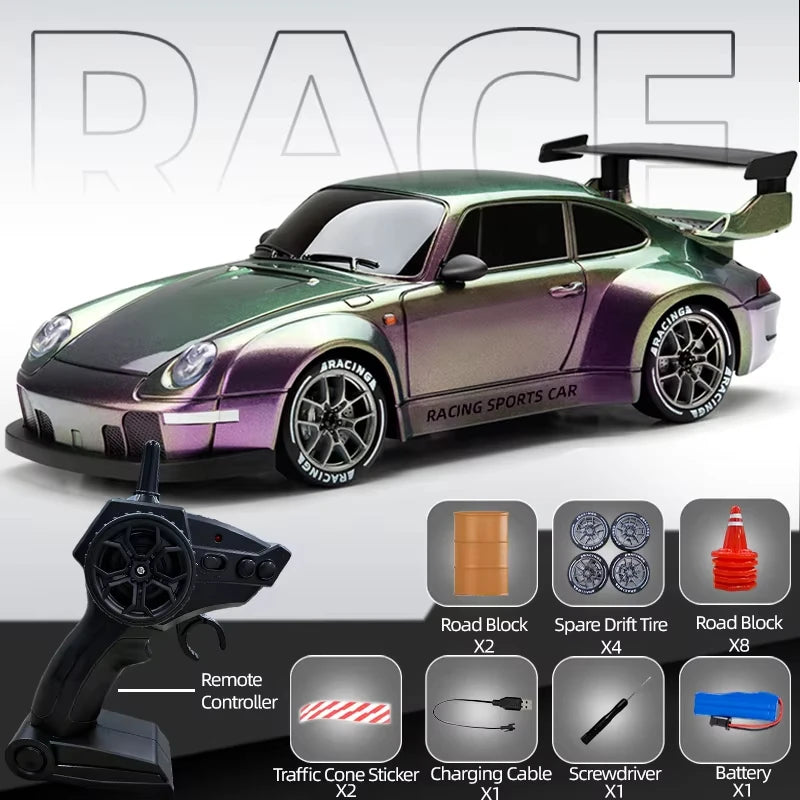 A green racing sports car model with various accessories including a remote controller and tools