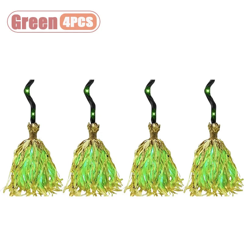 Four green animated witch brooms with LED glow lights