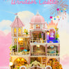 A detailed wooden Windsor Castle dollhouse kit featuring pink and white architecture with LED lighting and furniture.